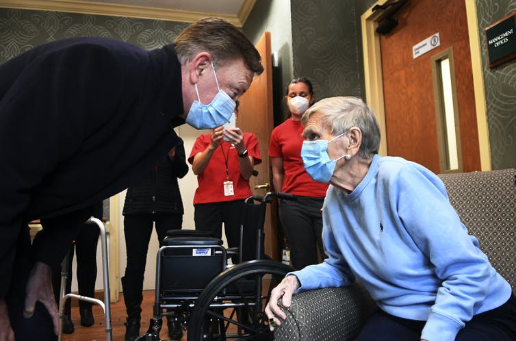 Jeanne Peters, 95, received the first COVID-19 vaccination at a nursing home on Dec. 18, 2020, in West Hartford, Conn.