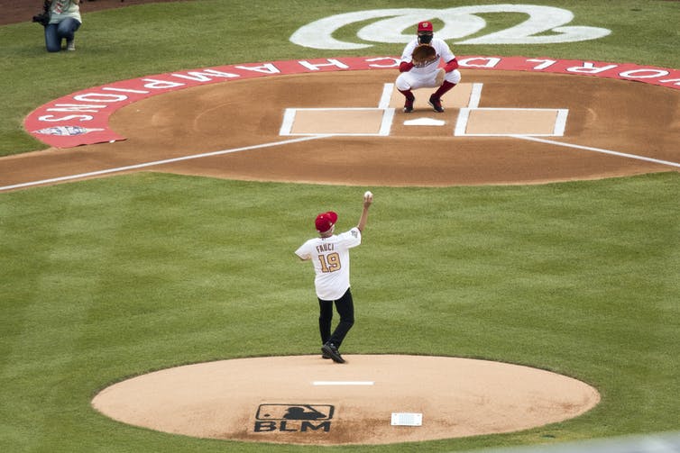 Fauci throws out a pitch at an MLB stadium