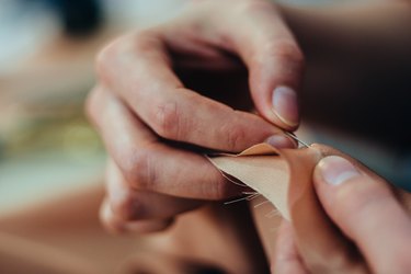 Dress maker working.