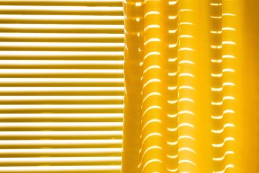 Yellow curtains and yellow blinds