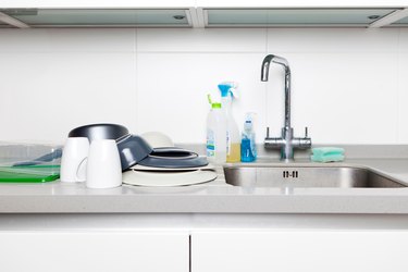 Dishes sitting on kitchen counter