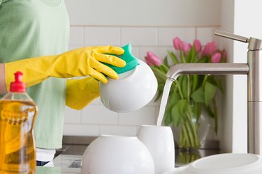 Woman washing dishes