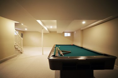Interior of basement with pool table