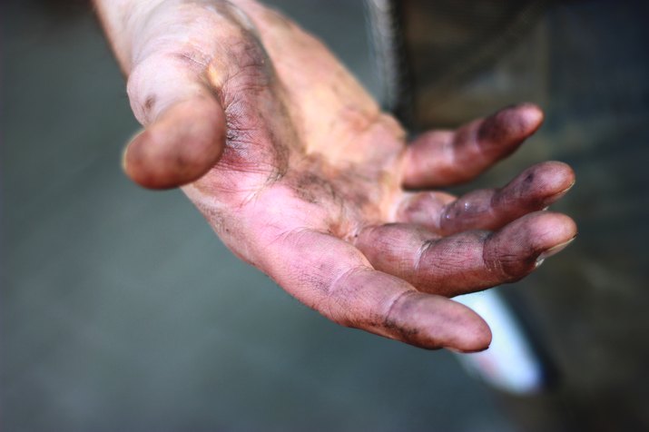 Dirty hands from a construction worker
