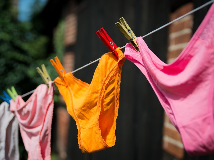 Underwear hanging on a string outside