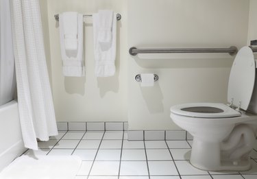 Bathroom with handicap fixture in white