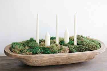 Candle and moss centerpiece