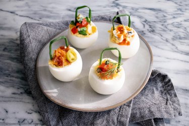 Deviled egg baskets with gourmet toppings