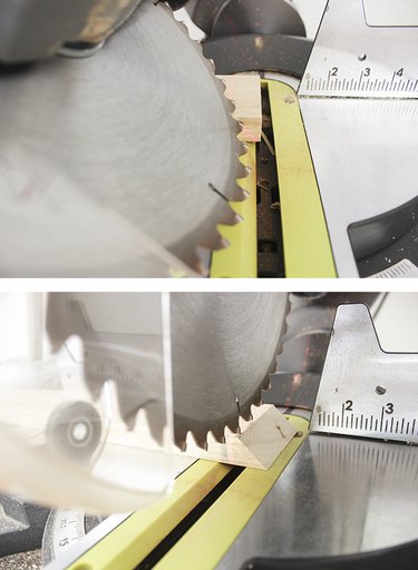 Cutting wood shelf supports with miter saw.