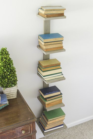 Wall mounted spine bookshelf view from above.