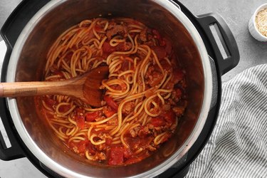 Stir spaghetti and let sit