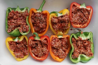 Fill bell peppers with sausage
