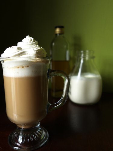 Mug of Irish Coffee with homemade low-carb sugar-free Irish cream liqueur.