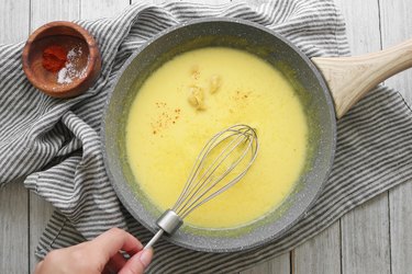 Whisk Hollandaise sauce