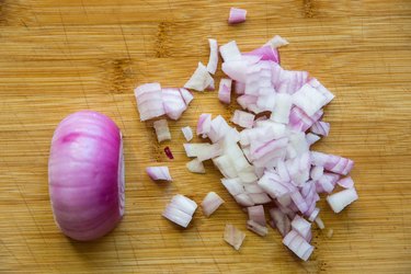 Chopped red onion on a cutting board
