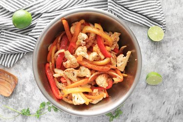 Toss vegetables with oil and spices