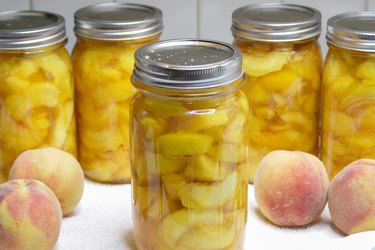 Even though fresh peaches are only available for a few months in the summer, there's no reason you can't enjoy them all year long. Just choose some fresh ripe peaches, grab a few jars, a little sugar, and you'll be on your way to preserving these delightful beauties in no time.