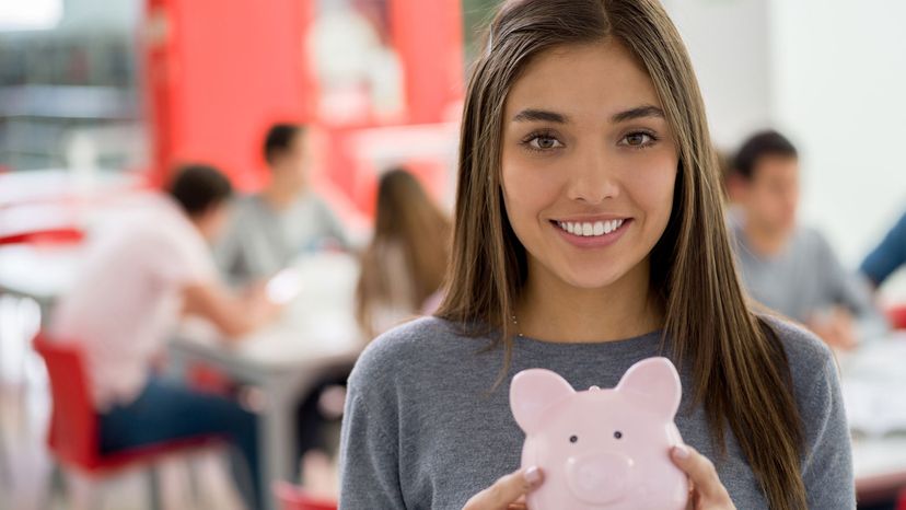 college girl with piggy bank