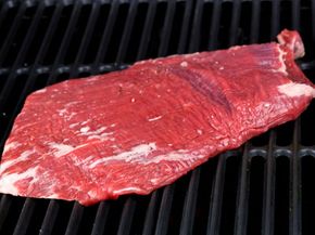 When grilling flank steak keep a close eye on cooking time, rather than the one beer method of keeping time.