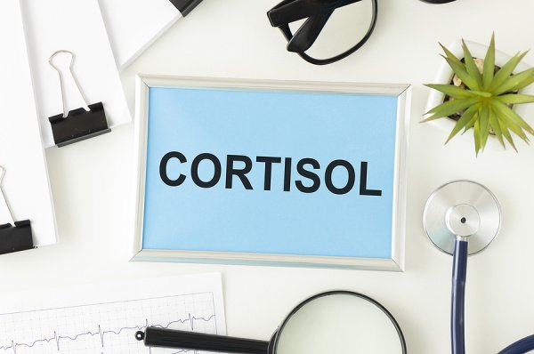 How to Reduce Cortisol Levels Naturally | Symptoms of high cortisol range from insomnia and fatigue, to belly bloat and weight gain, to IBS and high blood pressure and more. If you suspect you have an imbalance in your stress hormones and want natural tips to help lower cortisol secretion so you can sleep better, lose weight, and improve your health, this post is for you! We're sharing everything you need to know about cortisol, along with 9 natural ways to reduce it and live your best life!