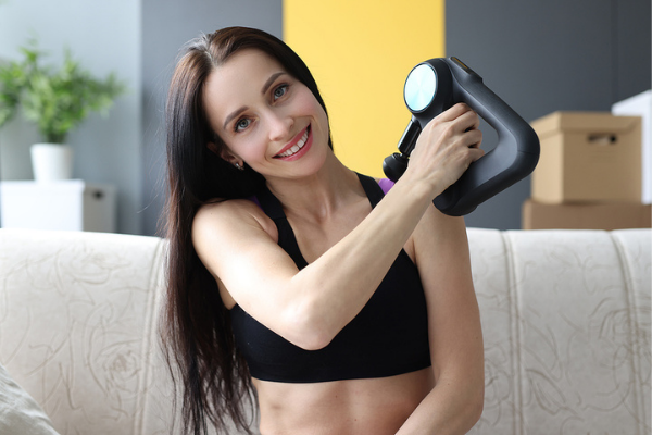 How to Use a Theragun to Relieve Sore Muscles | Whether you've just started a new fitness routine, or consider yourself an elite pro athlete, a massage gun offers many benefits, from treating sore muscles, to relieving pain, to boosting blood flow, to decreasing lactic acid, to improving ranging of motion and more. This post has lots of tips to help you get started - what the different attachments do, step by step videos for different muscle groups, and post-workout recovery tips.